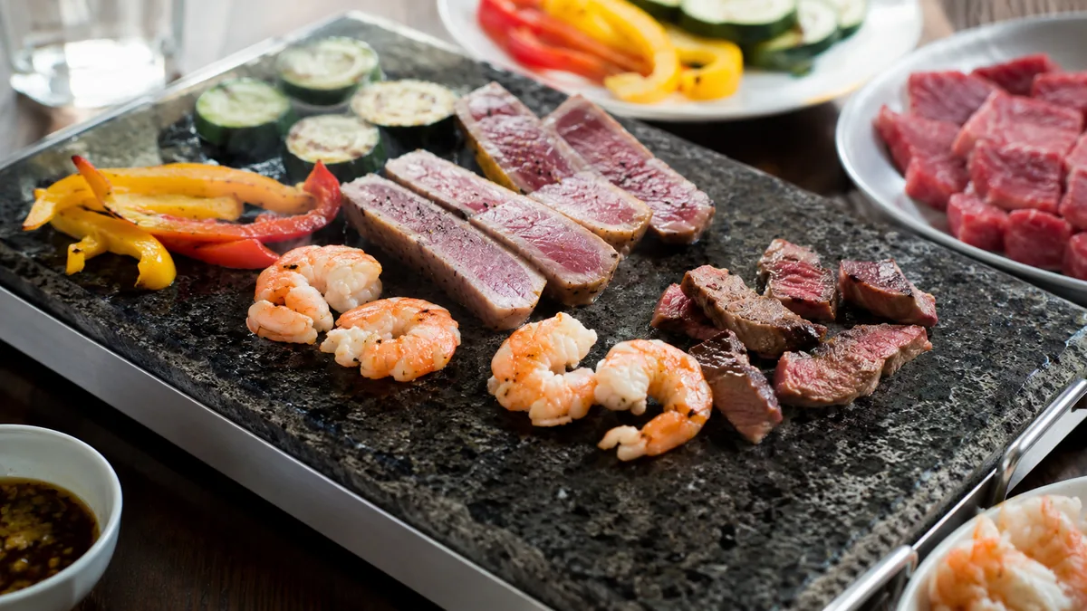 Comparatif de compositions pierrade viande poisson terre mer raclette